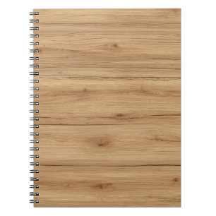 Natuurlijke eikenhouten planktextuur met warme tin notitieboek