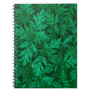 Natuurlijke groene achtergrond van groene bladeren notitieboek