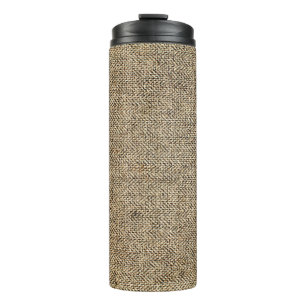 Natuurlijke linnen achtergrond, baggerwerk, beige thermosbeker