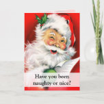 Naughty or Nice Winking Santa Greeting Feestdagen Kaart<br><div class="desc">Have you been naughty or nice? Folded Card with Happy Santa Claus is winking one eye while holding his list of naughty and nice children,  or a gift list for the folidays. Vintage portret of Santa is fun and jolly with his fluffy white beard and red outfit.</div>