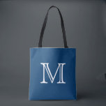 Nautical Blue White Monogram Tote Bag<br><div class="desc">Dit tas wordt zeker een favoriet! Deze canvas tas is ontworpen in een prachtige vorm van nautisch blauw en kan worden aangepast met een monogram of een initiaal van uw keuze. Maakt een geweldig tas voor het strand, vakantie, reizen, boeken, ambachten, of voor je dagelijkse tas.</div>