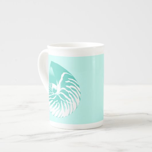 Nautilus shell - turquoise , aqua en white porselein kop (Links)