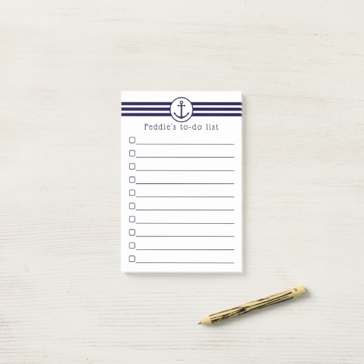 Nautisch anker met marineblauwe en witte strepen post-it® notes (Op bureau)
