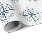 Nautisch kompas op getextureerde grijs cadeaupapier (Rol Hoek)