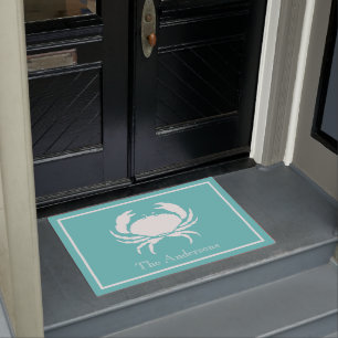 Nautisch ontwerp met witte krab op Blauwgroen blau Deurmat