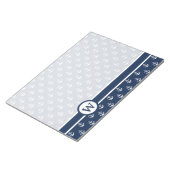 Nautisch wit anker op een blauw marineschandaal notitieblok (Schuin)