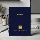 Navy Blue Leather Look Zakelijke logo en naam Planner<br><div class="desc">Blijf op orde en verhoog uw professionele afbeelding met onze Custom Spiral Planner, met een verfijnd marineblauw lederen uiterlijk dat sophisticatie combineert met functionaliteit. Met een aanpasbare vierkante ruimte op de cover kunt u uw zakelijke logo prominent weergeven over een gouden textuur, terwijl twee extra regels bewerkbare tekst ruimte bieden...</div>