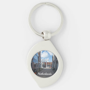 Nederlands dorp met traditionele houten brug sleutelhanger