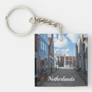 Nederlands dorp met traditionele houten brug sleutelhanger