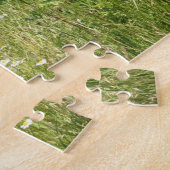 Nederlandse herdershond in een veld legpuzzel (Zijkant)