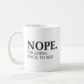 Nee. Ik ga terug naar bed. Koffiemok (Links)