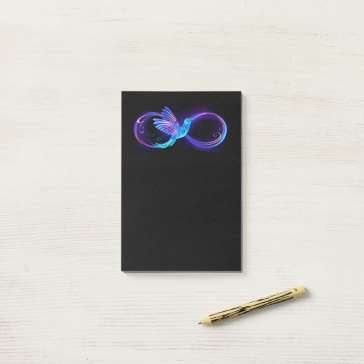 Neon Oneindigheidssymbool met Glowende Kolibrie Post-it® Notes (Op bureau)