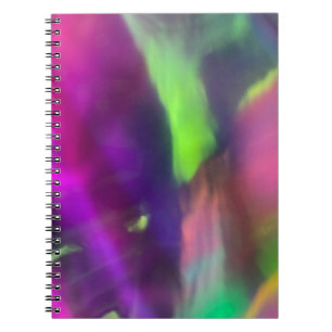 neon paarse gele roze groene lichtachtergrond notitieboek