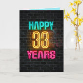 Neon-teken op baksteen voor 33e verjaardag kaart (Gele Bloem)