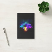 Neon vuurvlieg op zwart post-it® notes (Kantoor)