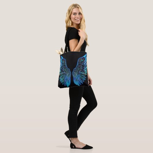 Neon zwarte en blauwe engelenvleugels tote bag (Op model)