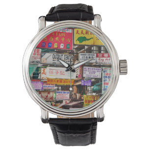 Neonlichtreclames in de straten van Hong Kong Horloge