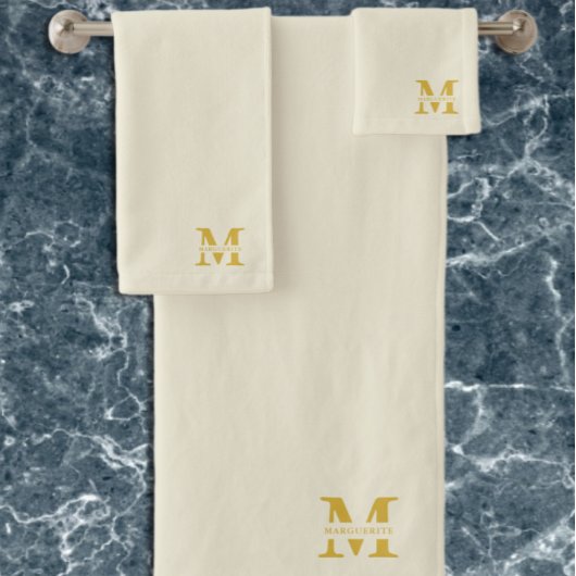Neutraal beige goud monogram bad handdoek
