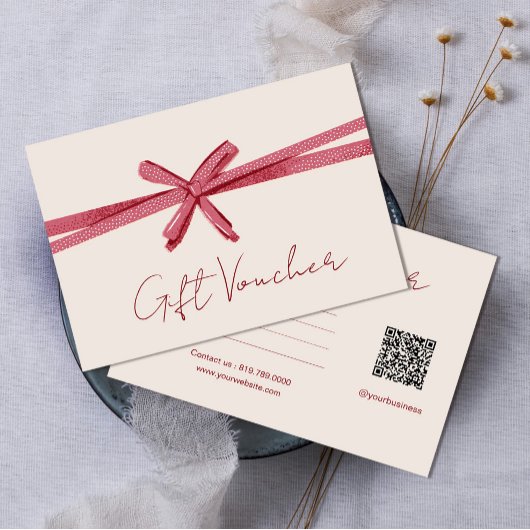 Neutrale roze lint op beige cadeaubon