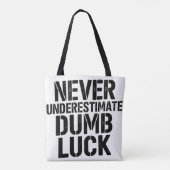 "Never Underestimate Dumb Luck" Saying Tote Bag (Achterkant)