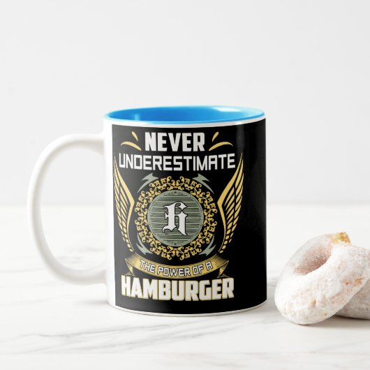 Never Underestimate The Power Of A Hamburger Tweekleurige Koffiemok (Met donut)