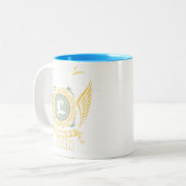 Never Underestimate The Power Of A Levin Tweekleurige Koffiemok (Voorkant links)