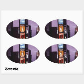 New York Times Square verkeer 's nachts Ovale Sticker (Vel)