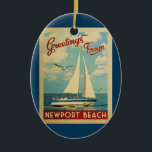 Newport Beach Sailboot Vintage Travel California Keramisch Ornament<br><div class="desc">Deze groeten van Newport Beach California,  het klassieke ontwerp van het zeevaartontwerp is voorzien van een boot die op het water zeilt met zeemijlen en een blauwe hemel gevuld met prachtige witte wolken.</div>