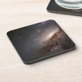 NGC 4258 Ondergaat intense stervorming. Bier Onderzetter (Linkerzijde)