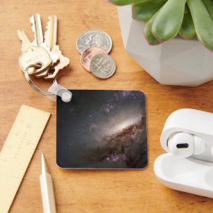 NGC 4258 Ondergaat intense stervorming. Sleutelhanger