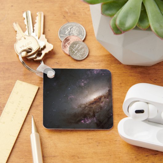 NGC 4258 Ondergaat intense stervorming. Sleutelhanger (Bureau)