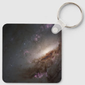 NGC 4258 Ondergaat intense stervorming. Sleutelhanger (Achterkant)