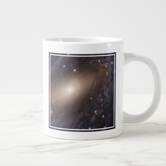 NGC 6744, op 30 miljoen lichtjaar afstand. Grote Koffiekop (Rechts)