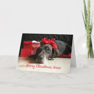 Niece merry kerstpointer en giften in vuurpla feestdagen kaart