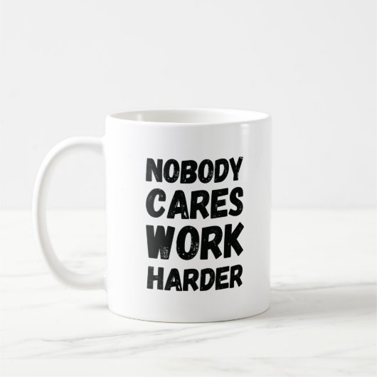 Niemand maakt werk harder koffiemok (Links)