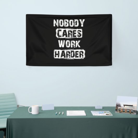 Niemand maakt werk harder spandoek (Beurs)