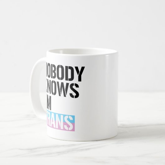 Niemand weet dat ik Trans ben - Koffiemok (Voorkant links)