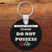 NIET BEZIT SLEUTELHANGER (Voorkant)