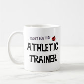 Niet de Athletic Trainer Mok aandoen (Links)