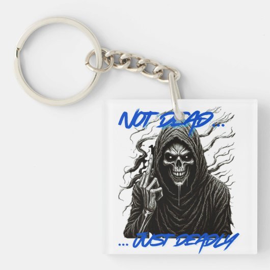Niet dood, gewoon dodelijk sleutelhanger (voorkant)