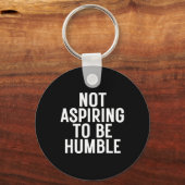 Niet streven om nederig te zijn 1 sleutelhanger (Voorkant)