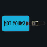 Niet uw Bagagelabel<br><div class="desc">Dit bagagelabel van The Not Yours is een slimme manier om de mensen in de bagagecarrousel te vertellen dat ze moeten blijven kijken. Hij is voorzien van een levendige,  blauwe achtergrond en vetgedrukt,  zwart schrift dat luidt: "Niet van u!" De tegenovergestelde kant is klaar voor aanpassing.</div>