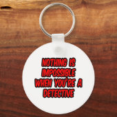 Niets is onmogelijk...rechercheur sleutelhanger (Voorkant)