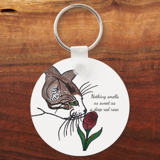 Niets ruikt zo zoet als een dieprode roos sleutelhanger (Achterkant)