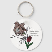 Niets ruikt zo zoet als een dieprode roos sleutelhanger (Achterkant)