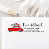 Nieuw adres rode auto met kerstboom label (Insitu)