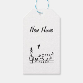 Nieuw thuis, zangvogel met sleutel van nieuw huis cadeaulabel