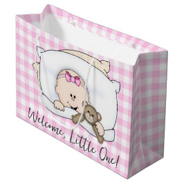 Nieuwe babymeisje met teddybeer op geruit groot cadeauzakje