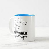 Nieuwsgierig katje dat gemakkelijk verstoord wordt tweekleurige koffiemok (Voorkant links)