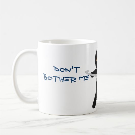 Ninja met de Mok van Crochet Hook (Links)